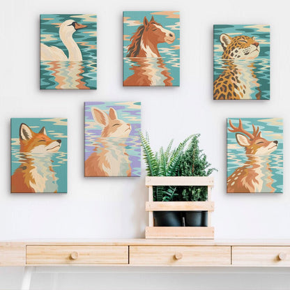 Animal Reflections mini paintings displayed on a wall