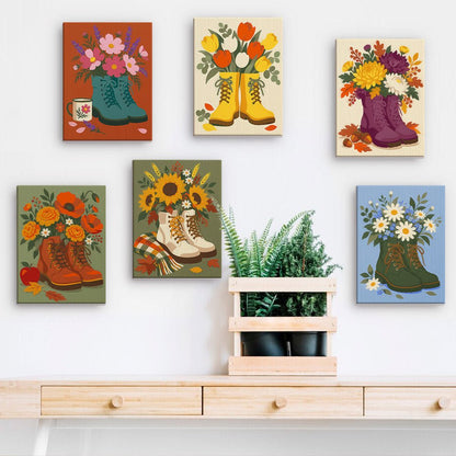Blooming Boots mini paintings displayed on a wall