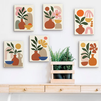 Boho Potted Plants mini paintings displayed on a wall