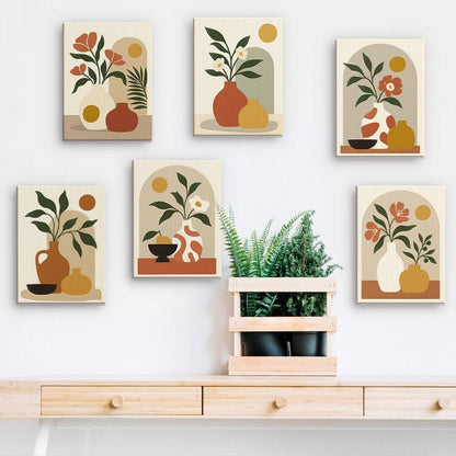 Boho Terracotta mini paintings displayed on a wall