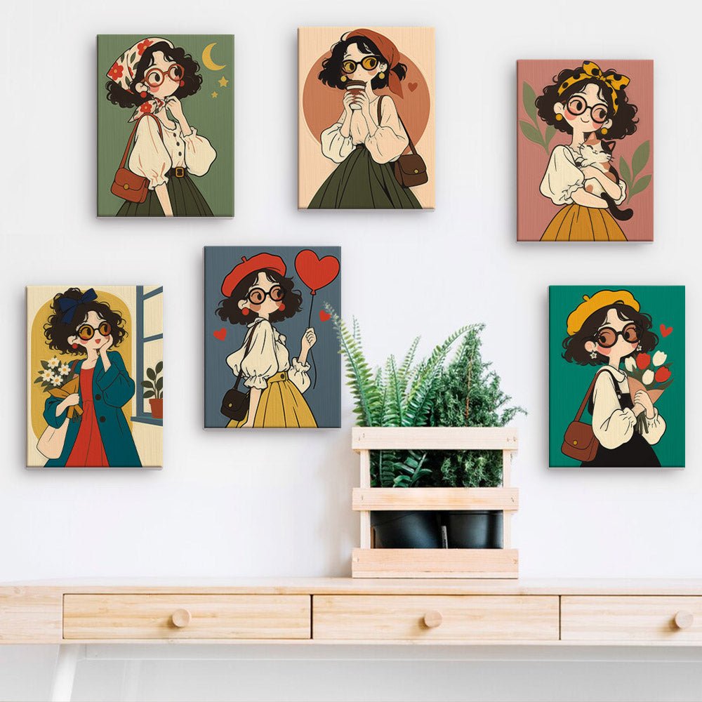 Bookish Girls mini paintings displayed on a wall