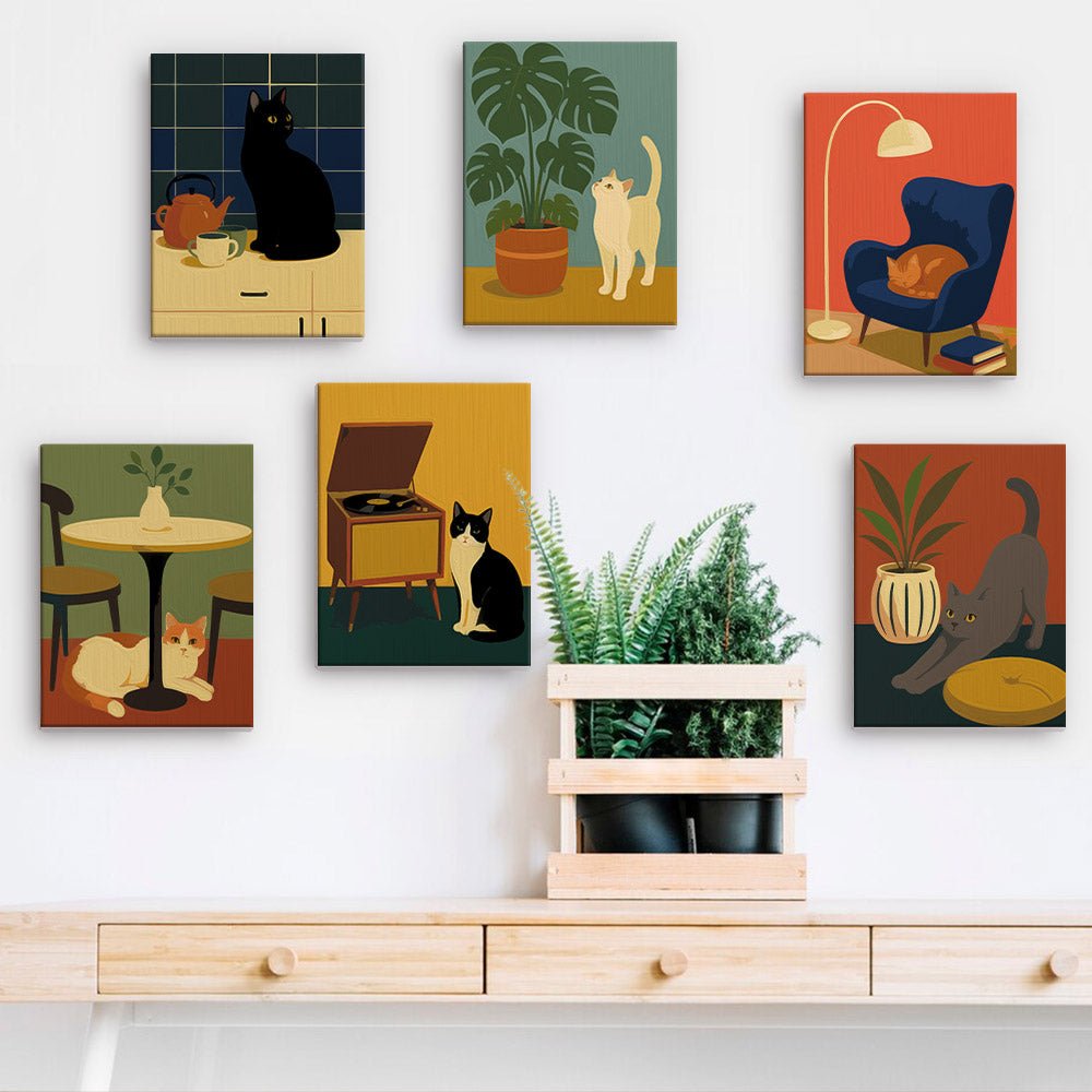 Cats at Home mini paintings displayed on a wall