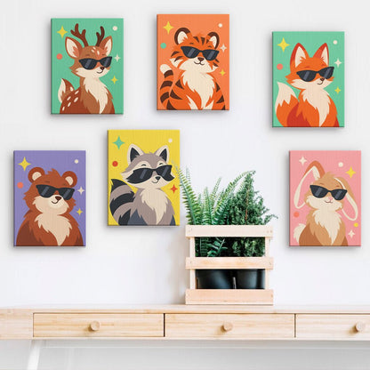 Cool Critters mini paintings displayed on a wall