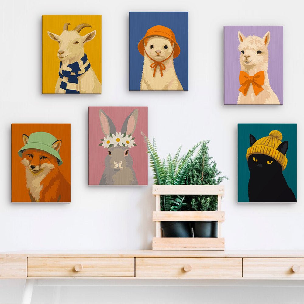 Dressed-Up Animals mini paintings displayed on a wall