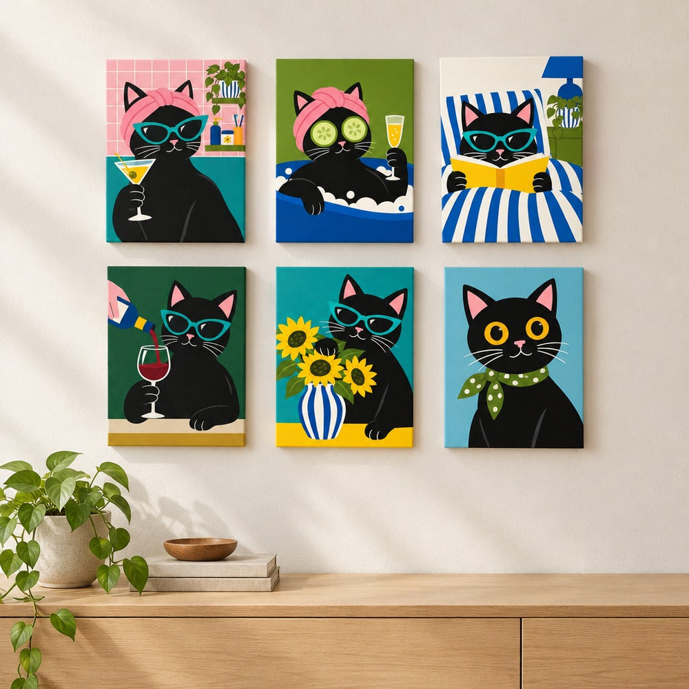 Fancy Feline Nights mini paintings displayed on a wall
