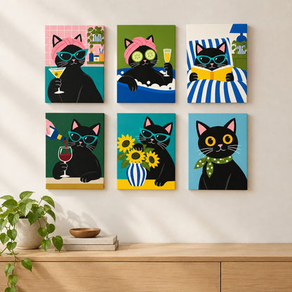 Fancy Feline Nights mini paintings displayed on a wall