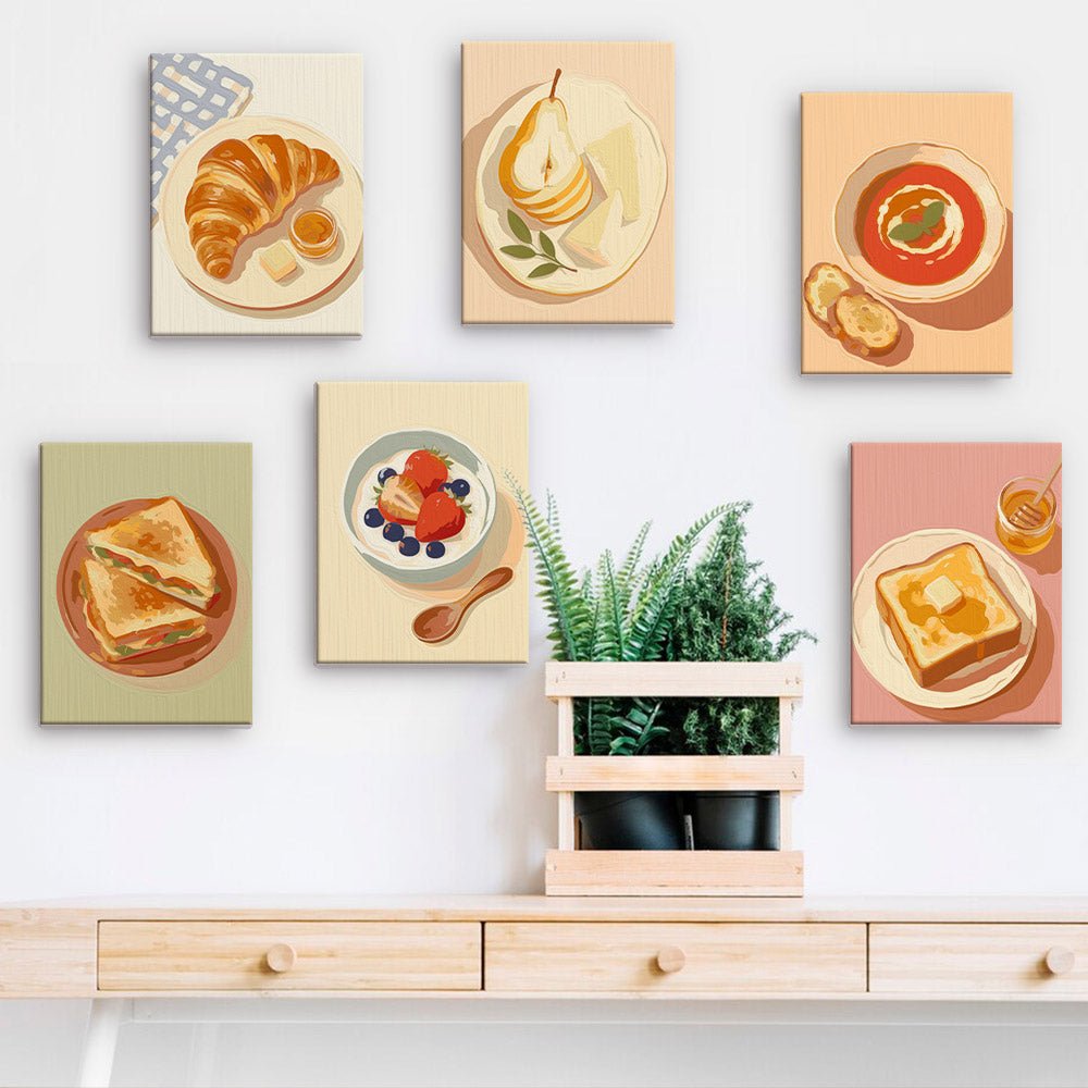 French Breakfast mini paintings displayed on a wall