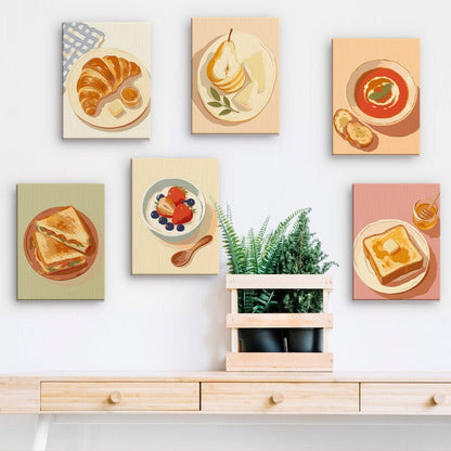 French Breakfast mini paintings displayed on a wall