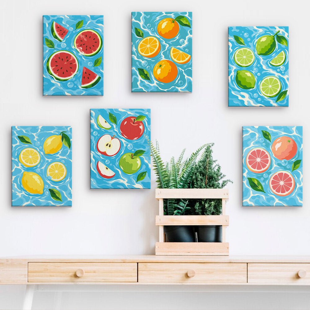 Fruit Splash mini paintings displayed on a wall