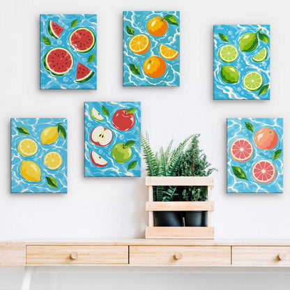 Fruit Splash mini paintings displayed on a wall