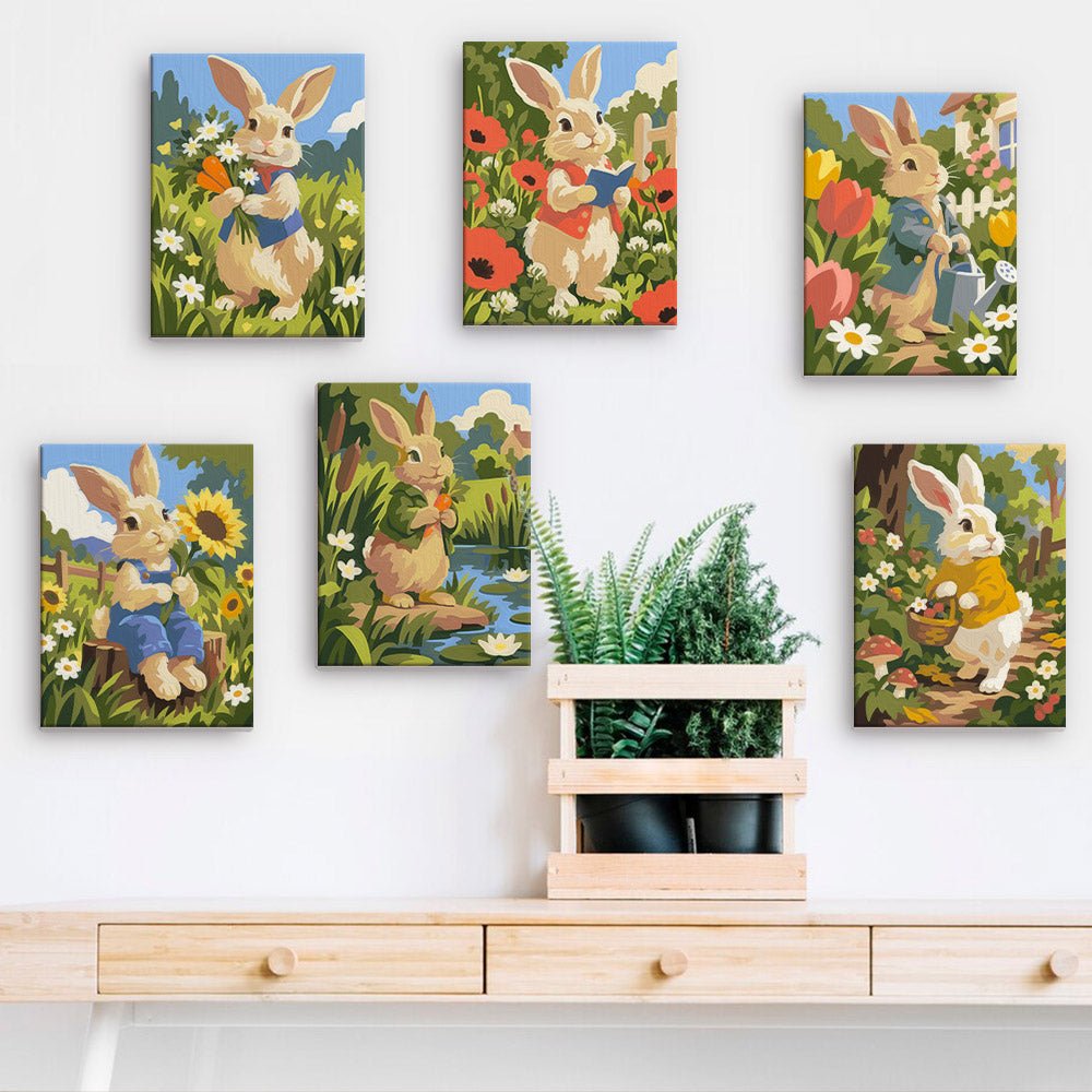 Garden Bunnies mini paintings displayed on a wall