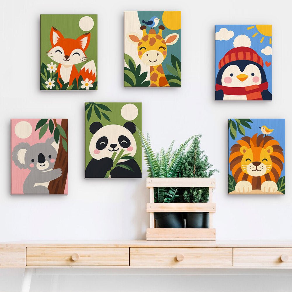 Jungle Babies mini paintings displayed on a wall