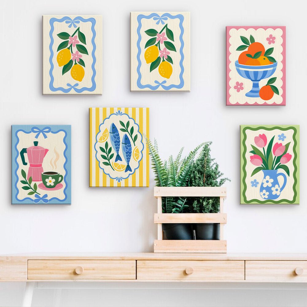 Kitchen Charms mini paintings displayed on a wall