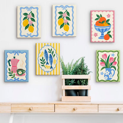 Kitchen Charms mini paintings displayed on a wall