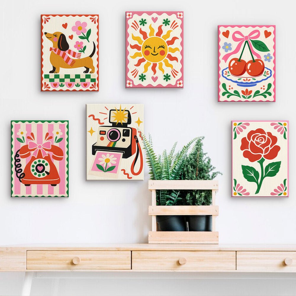 Kitsch Classics mini paintings displayed on a wall