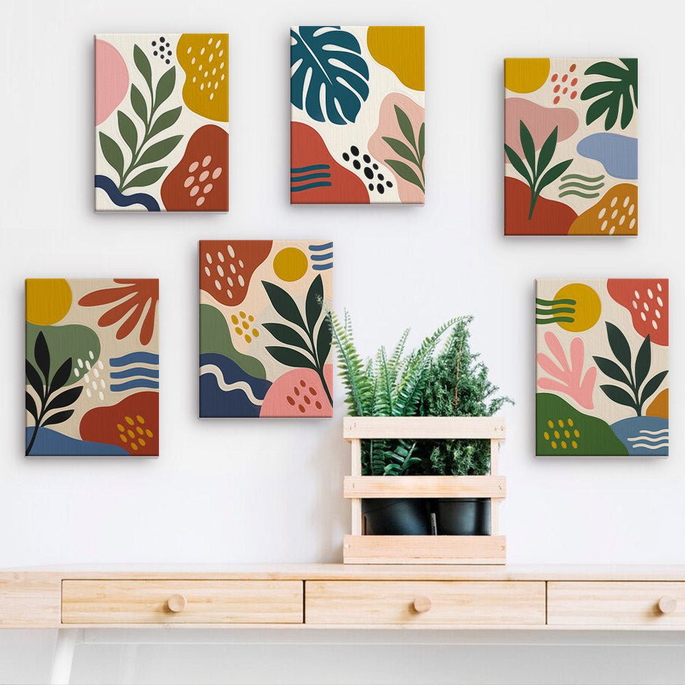 Leaf Collage mini paintings displayed on a wall