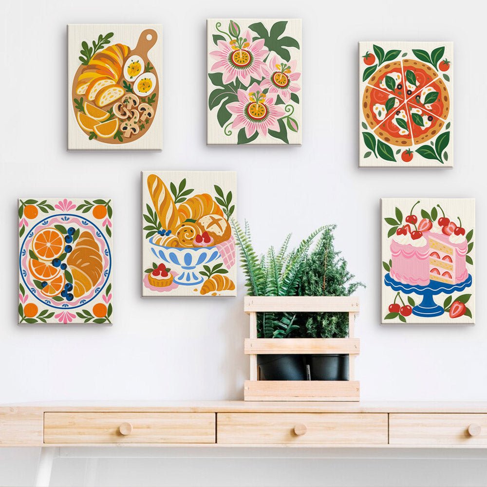 Majolica Kitchen mini paintings displayed on a wall