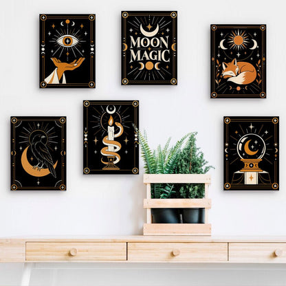 Moon Magic mini paintings displayed on a wall
