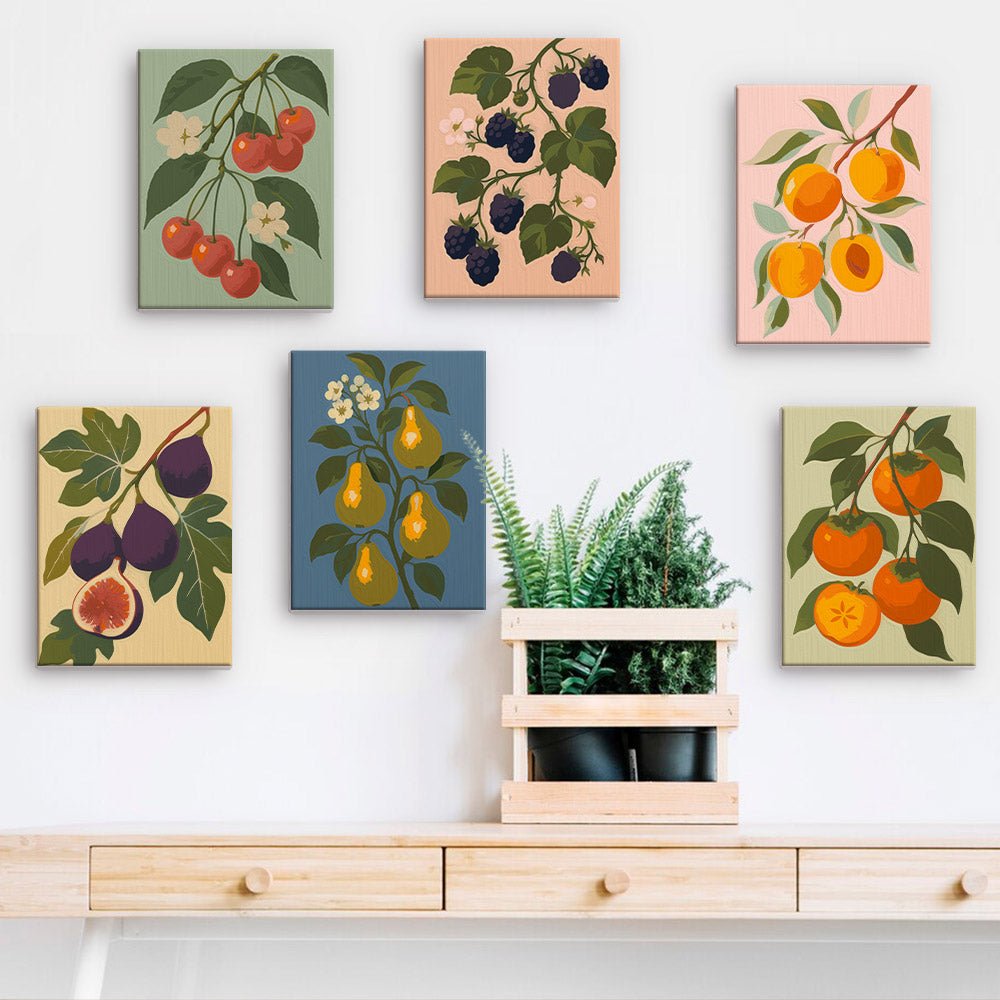 Orchard Fruits mini paintings displayed on a wall