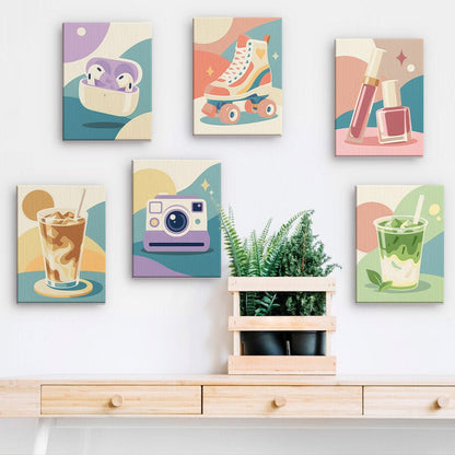 Pastel It Girl mini paintings displayed on a wall