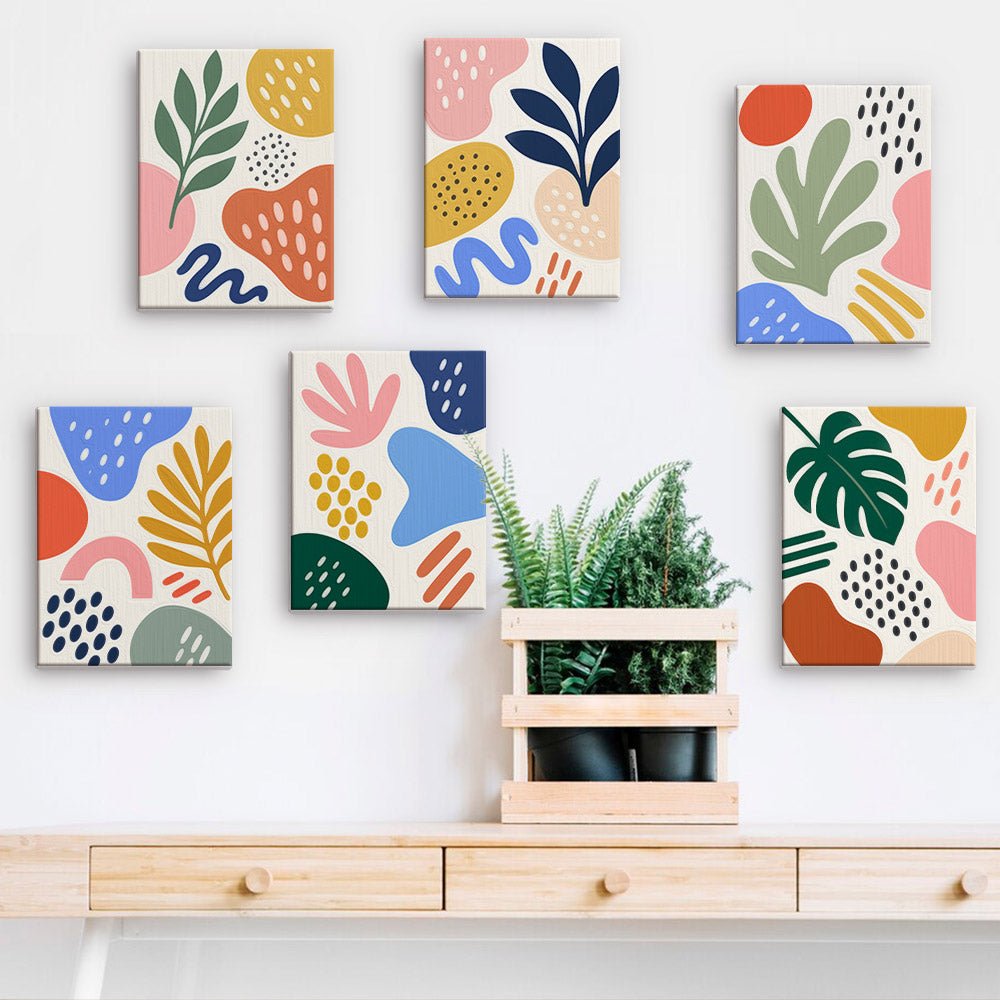 Playful Shapes mini paintings displayed on a wall