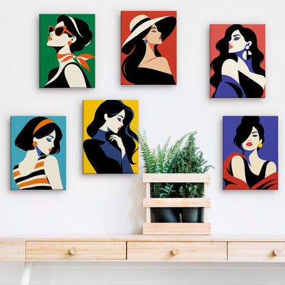 Pop Art Divas mini paintings displayed on a wall