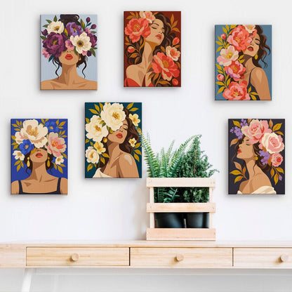 Rose Goddesses mini paintings displayed on a wall