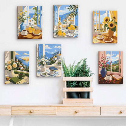Seaside Cafe Views mini paintings displayed on a wall