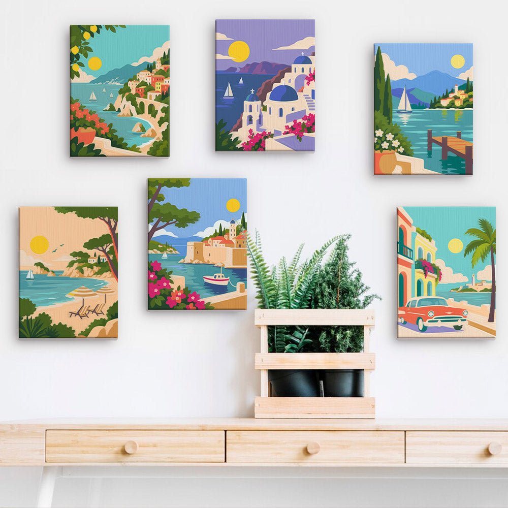 Seaside Towns mini paintings displayed on a wall