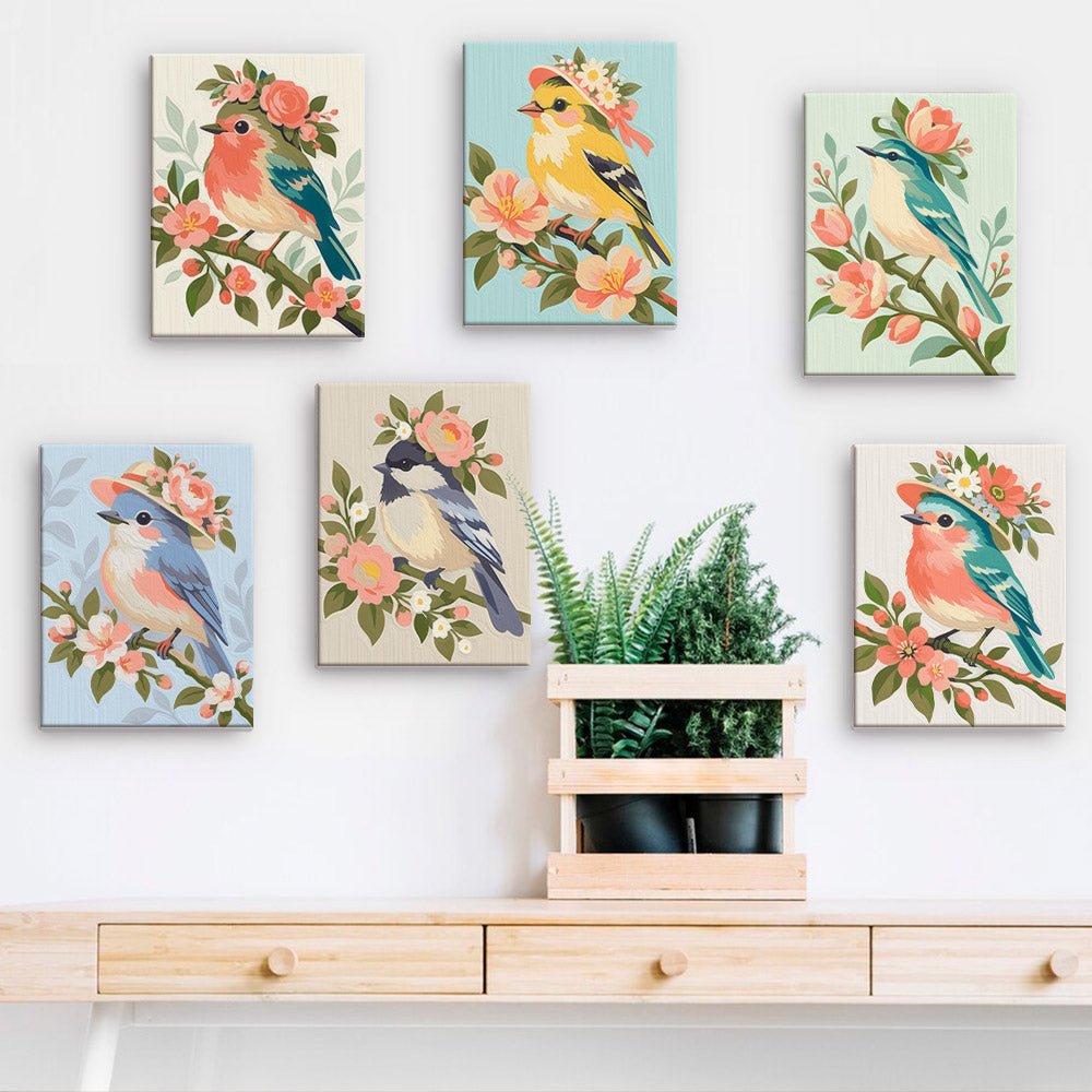 Spring Songbirds mini paintings displayed on a wall