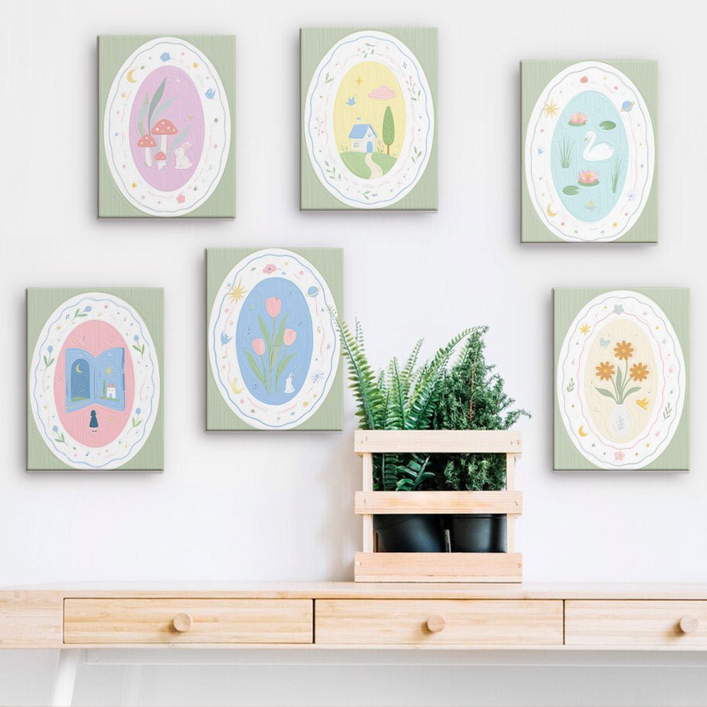 Storybook Cameos mini paintings displayed on a wall