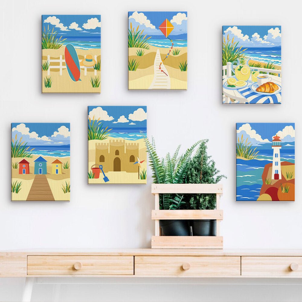 Summer by the Sea mini paintings displayed on a wall
