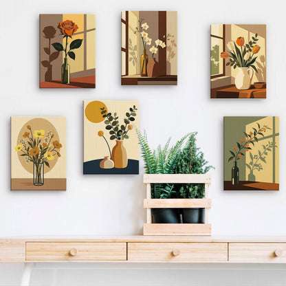 Sunlit Shadows mini paintings displayed on a wall