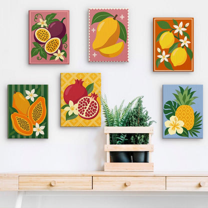 Tropical Fruit Stamps mini paintings displayed on a wall