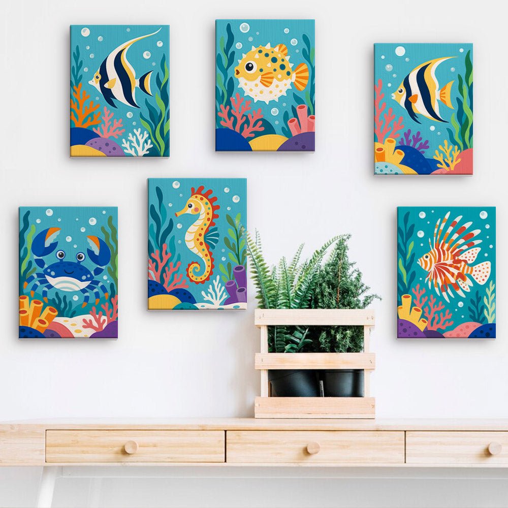 Tropical Reef Fish mini paintings displayed on a wall