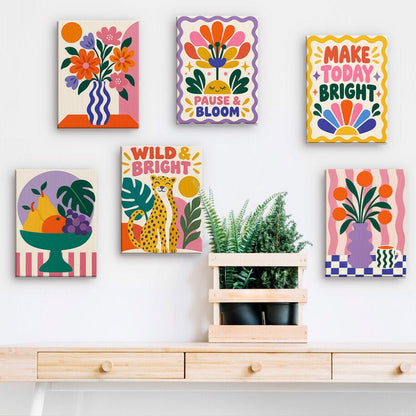 Wild and Bright mini paintings displayed on a wall