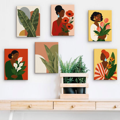 Women in Bloom mini paintings displayed on a wall